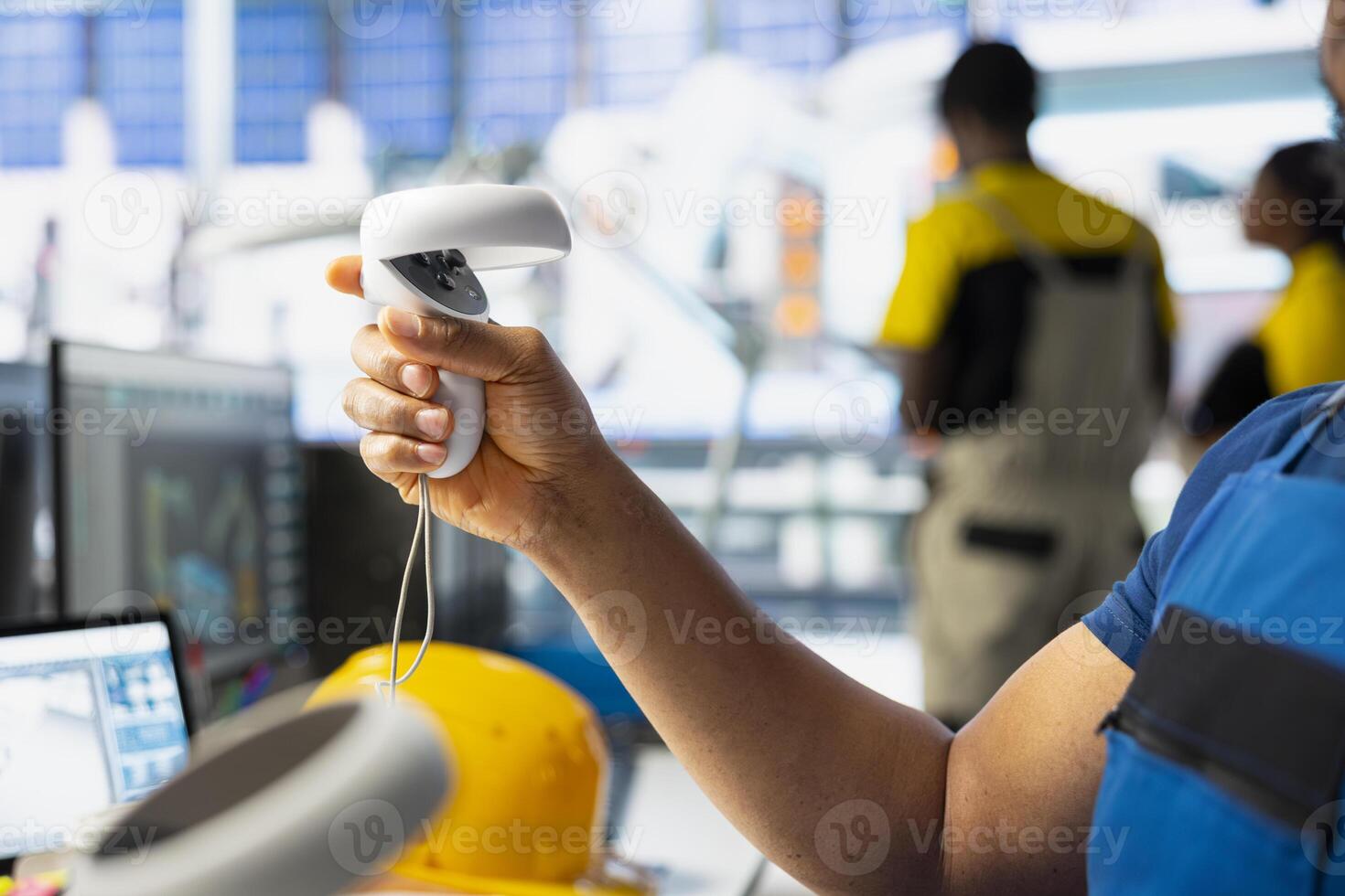 Black employee in solar panel facility uses virtual reality tech for troubleshooting and fixing technical errors within the photovoltaic systems. Male plant worker using VR headset for inspection. photo