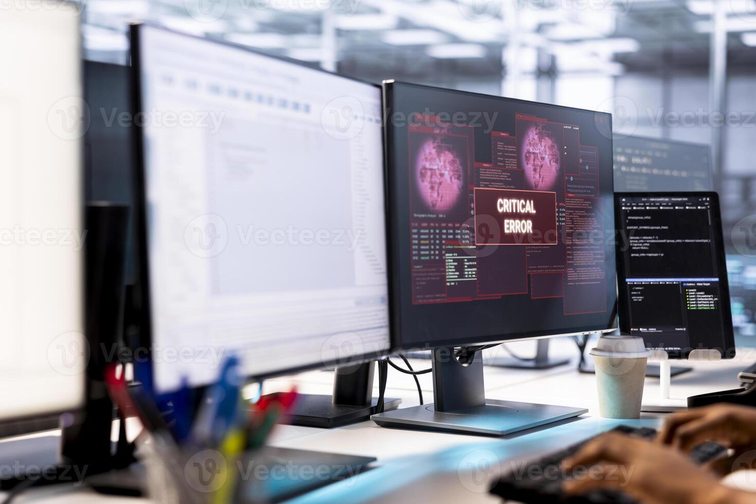 System administrator in server farm fighting hacker managing to pass firewall and stealing data. Worker receiving critical error notification on PC display in data center workspace photo
