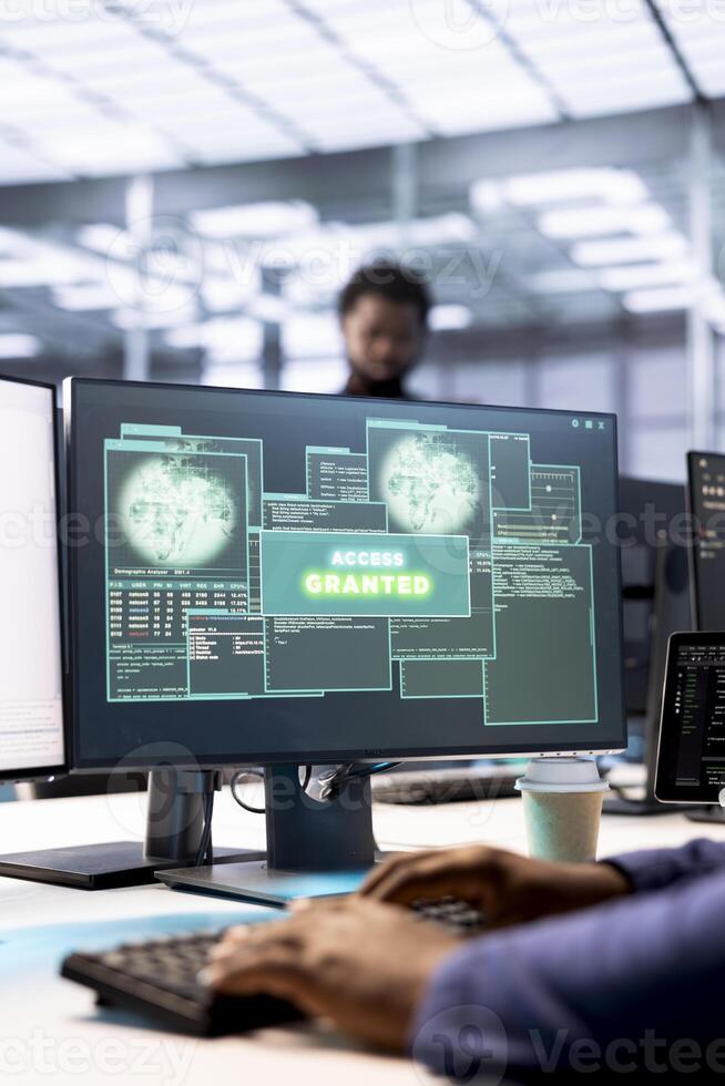Close up of access granted notification on screen received by developer reconfiguring server hub, optimizing it. Data center IT expert using PC to successfully eliminate all errors photo