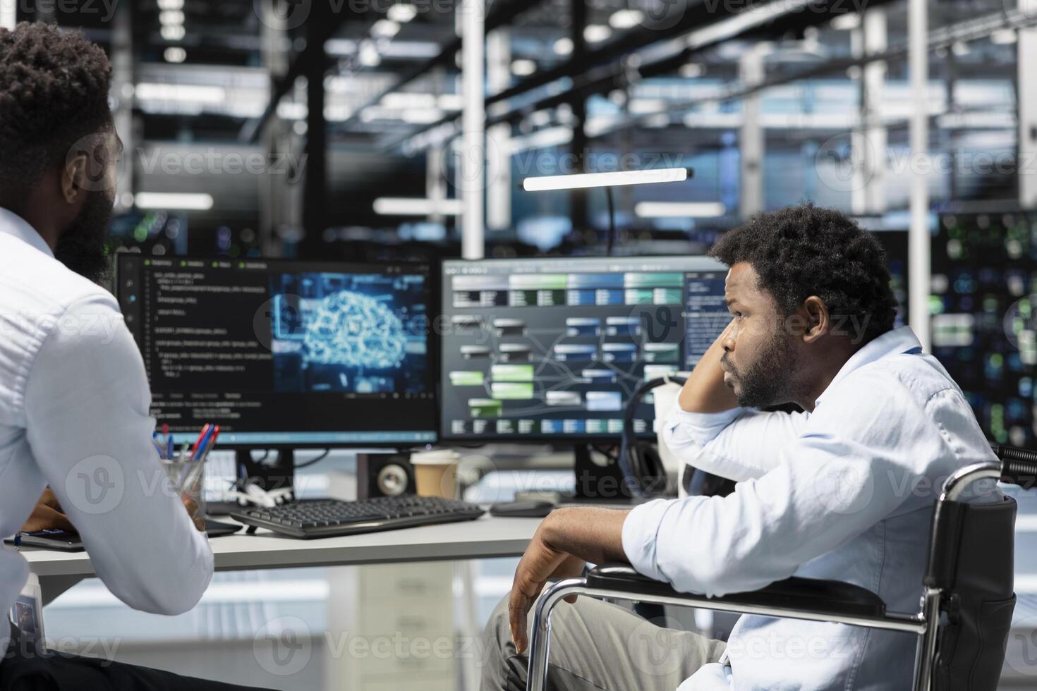 Data center supervisor and programmer with paraplegia using artificial intelligence computerized model. Server room manager and IT expert with disability using machine learning AI algorithms photo