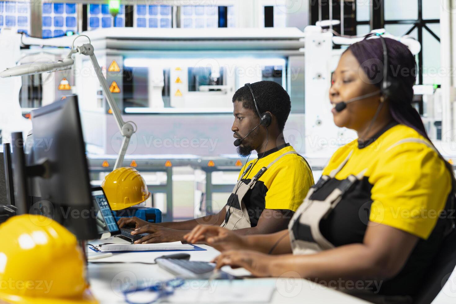 Black female plant worker offering guidance in troubleshooting errors at solar facility call center, managing help line requests for support and maintenance. Customer service operator. photo