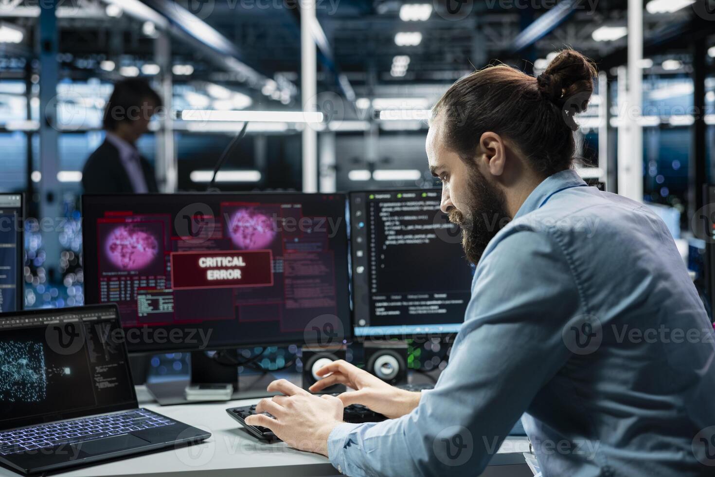 Data center programmer typing on PC keyboard, fixing error warning popup on screen using . Server hub worker using artificial intelligence chatbot to eliminate glitch alert on monitor photo