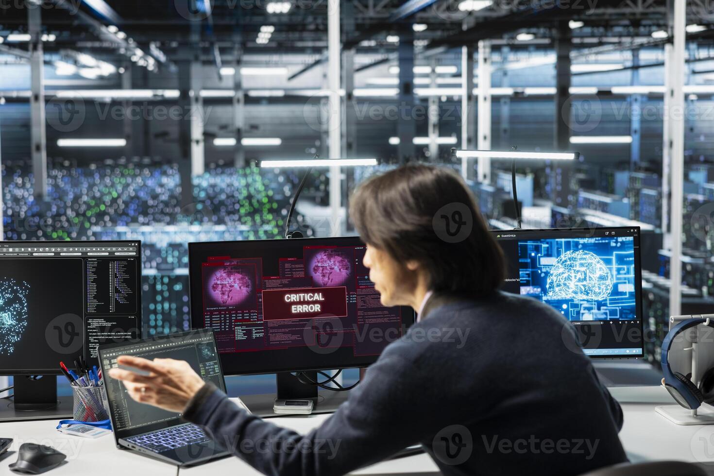 Data center software developer struggling to fix malfunctions while using AI tools. Server farm IT expert receiving critical error while using artificial intelligence to optimize system health photo