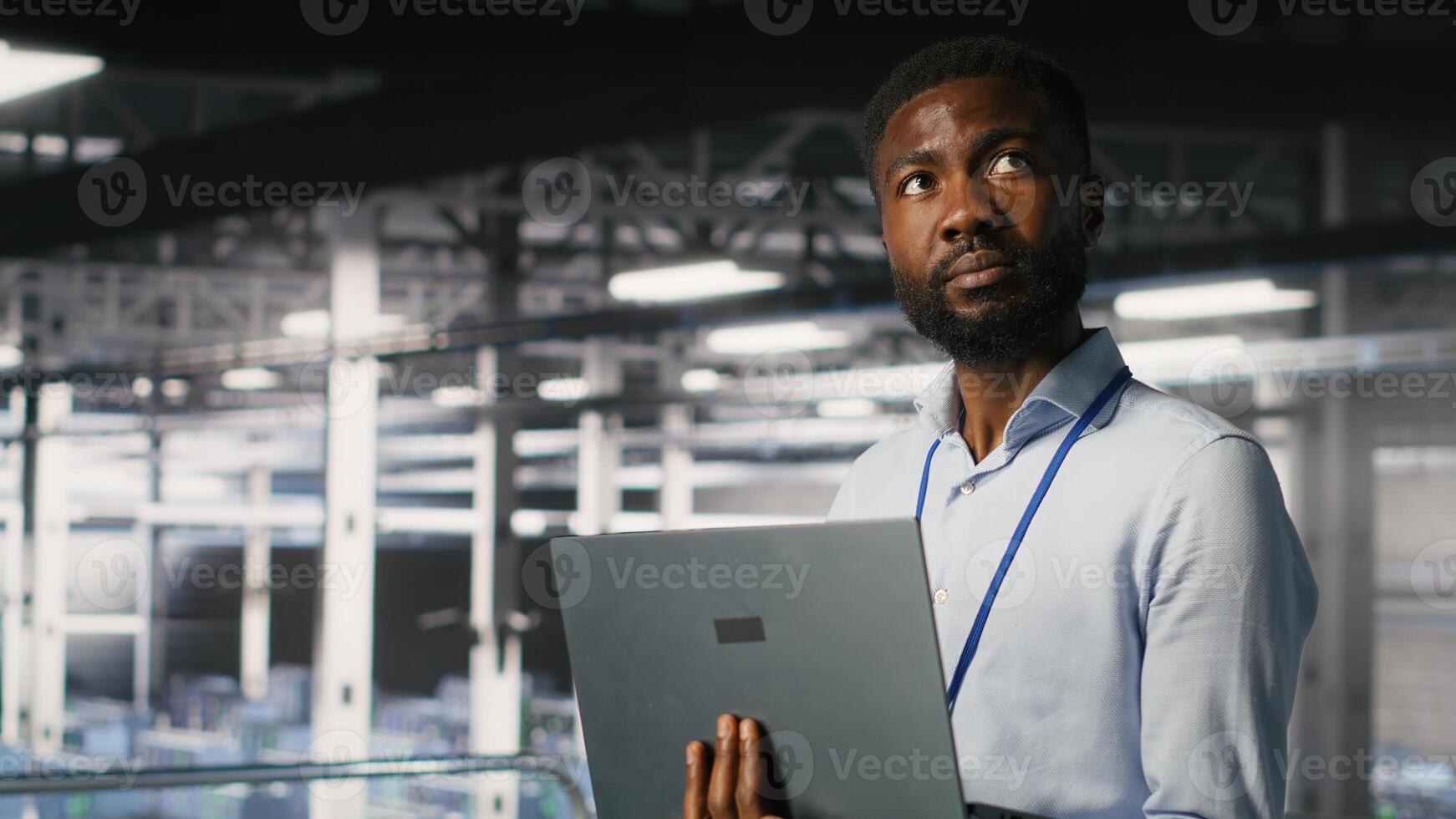 Engineers in data center using laptop to monitor neural network LLM visualization. Coworkers on server hub industrial platform overseeing server clusters powering machine learning processes photo