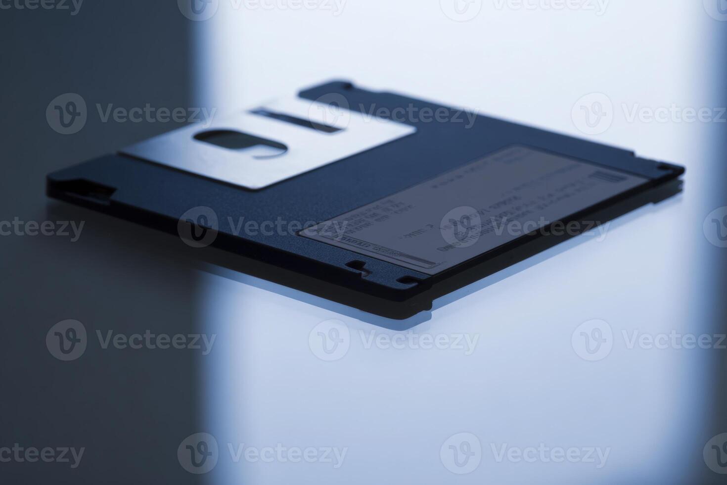 Reflections of a disk on a smooth glass surface with soft lighting photo