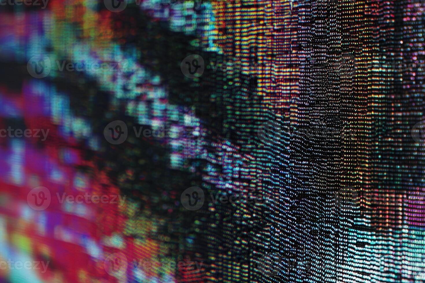 Digital screen displaying partial pixel dropout with colorful patterns photo