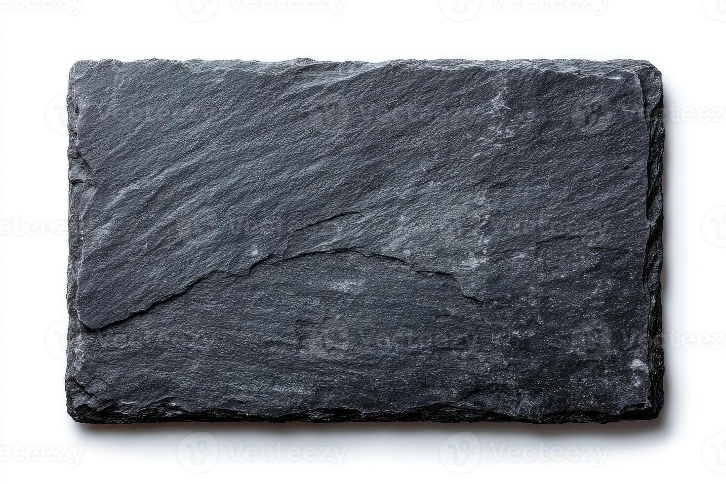 Top-down view of a rectangular, textured gray slate serving board on a white background photo
