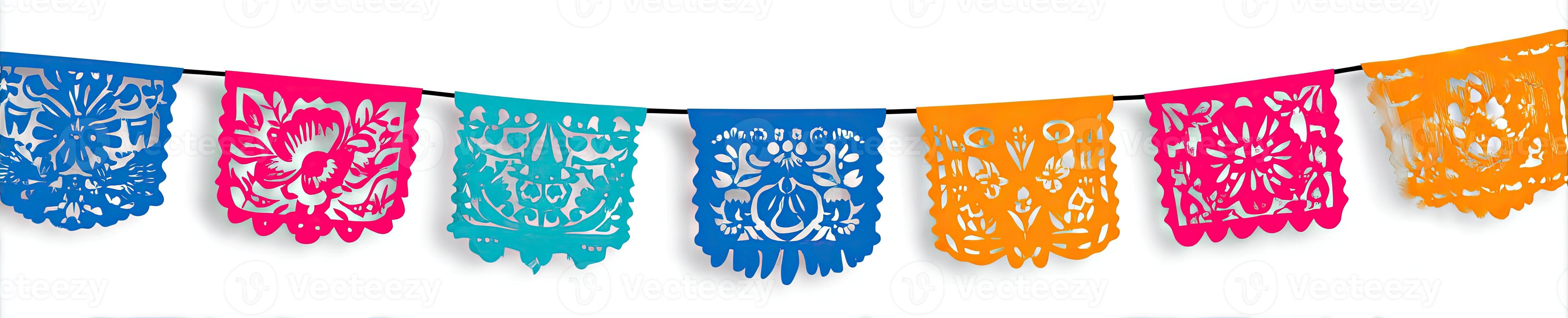 A string of colorful paper flags, cut with intricate patterns, strung across a white background photo