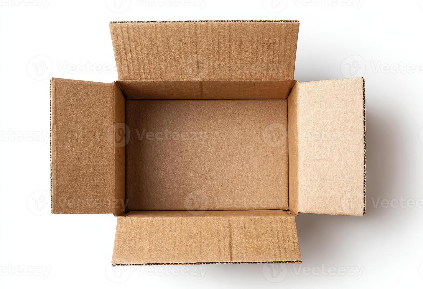 Overhead shot of an empty, opened cardboard box on a white surface photo