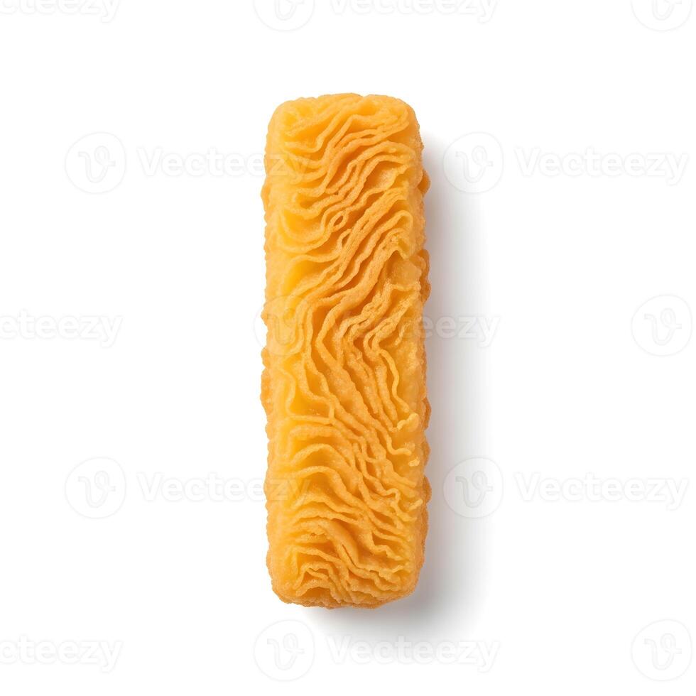 Golden yellow savory snack with an intricate and abstract wavy texture, isolated from a top view on a clean white background with soft shadow photo