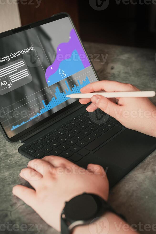 Analyst uses digital tablet and dashboard for data business analysis. Data Management System concept. Technology finance, sales and marketing operations. photo