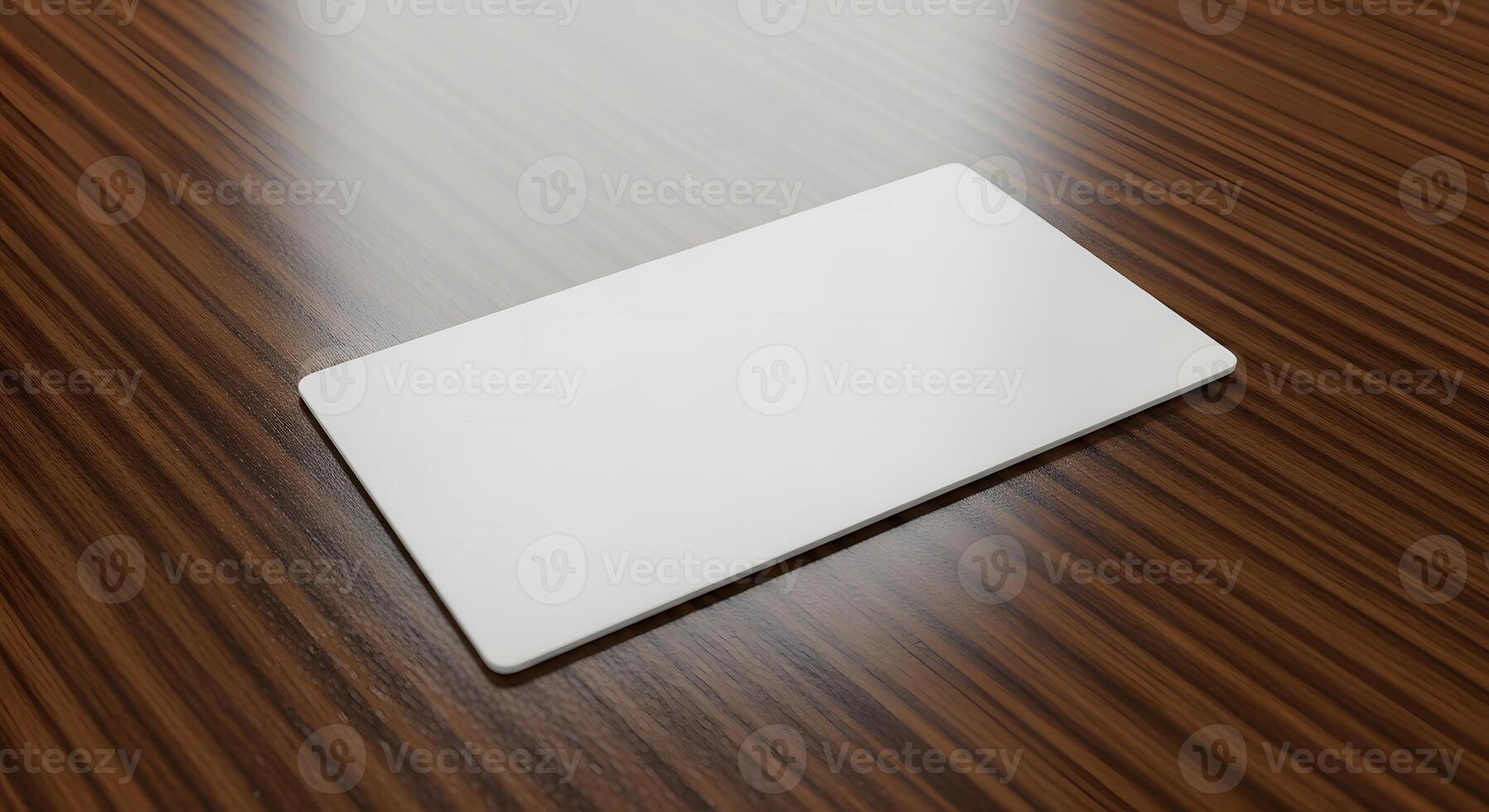 Blank white rectangular card mockup with soft rounded corners, elegantly placed on a polished dark wooden table, offering a clean canvas for branding and design projects photo