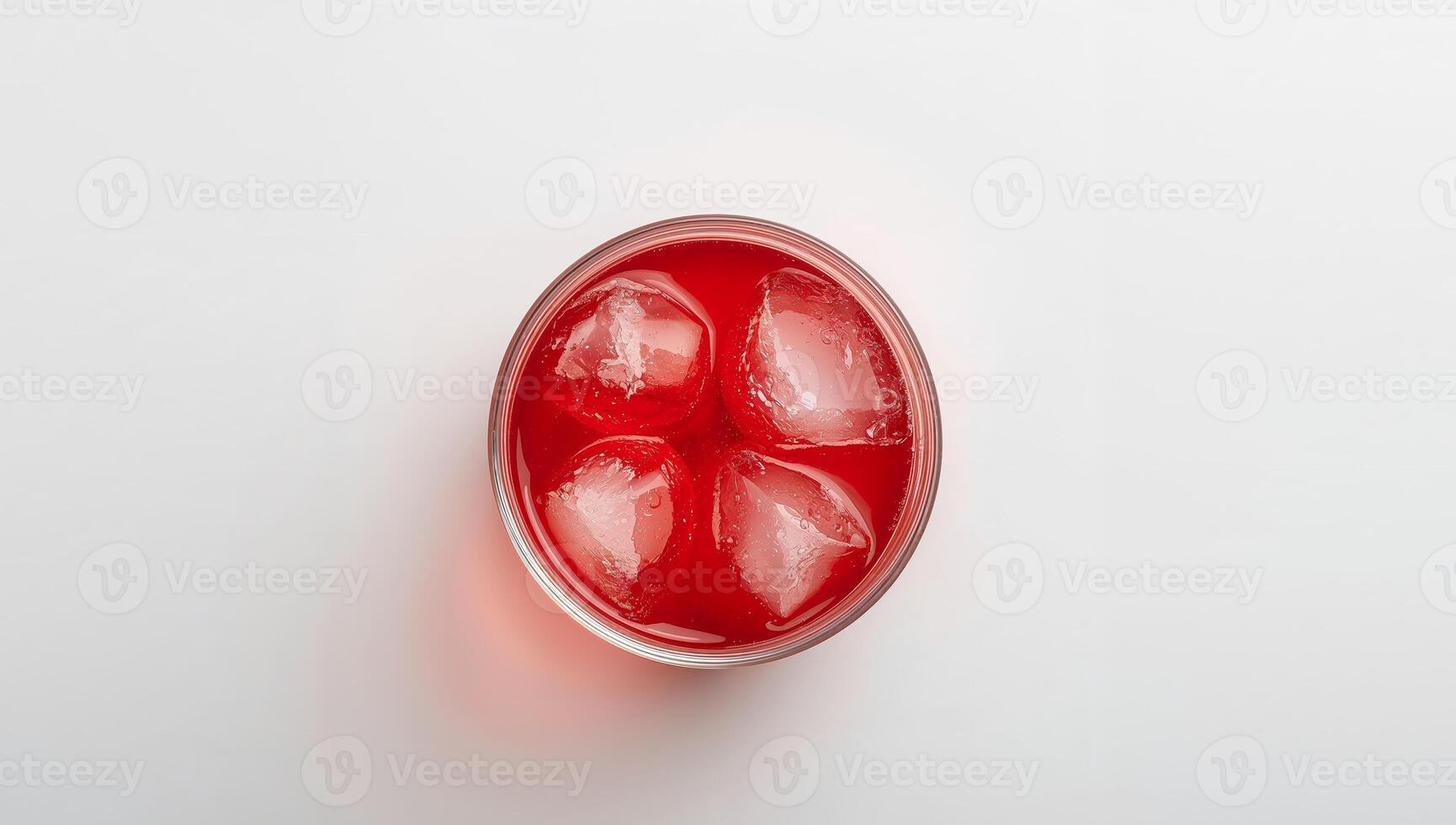 Ruby Red Refreshment A Chilled Drink with Textured Ice Cubes, Minimalist Presentation. photo
