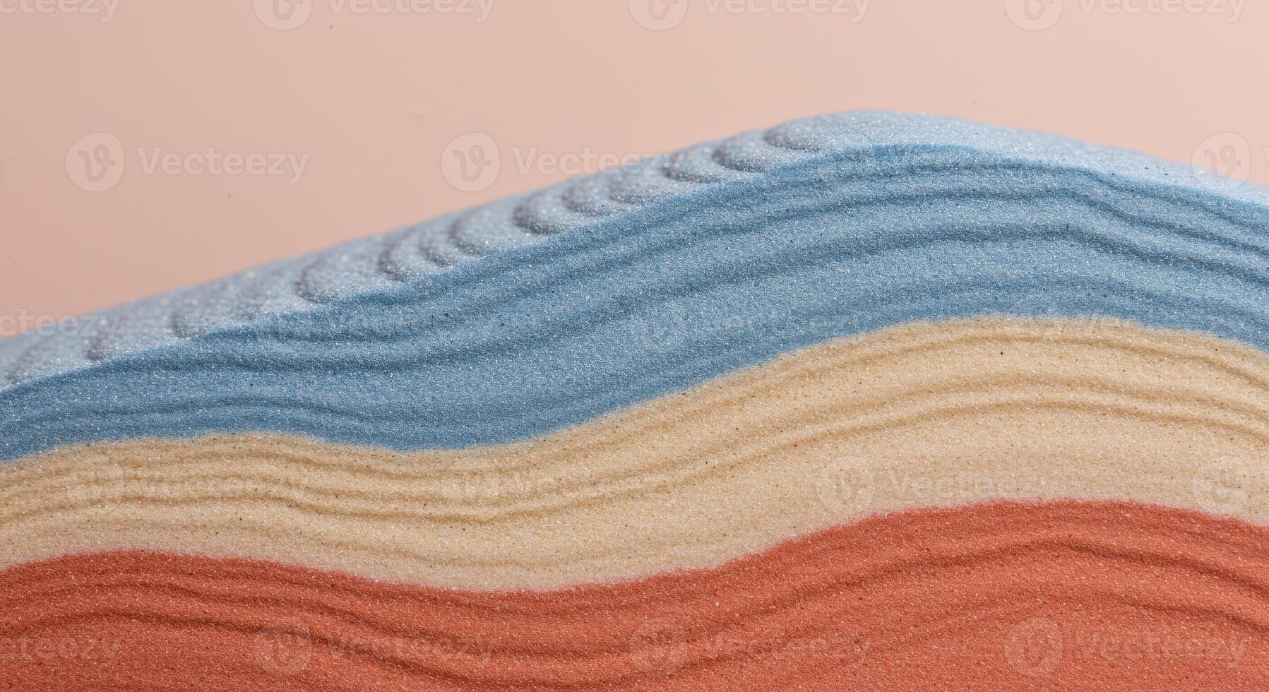 A calm and beautiful abstract background featuring the gentle patterns of layered sand. The soft colors and detailed texture create a serene and organic composition photo