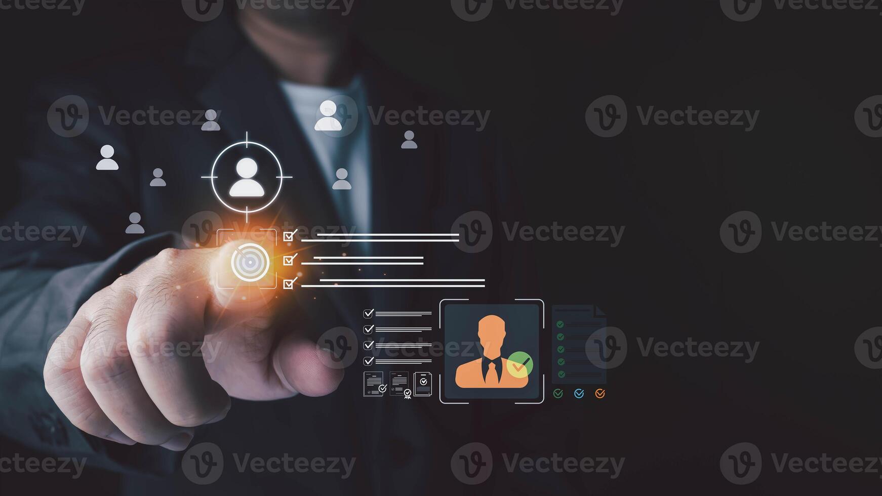 A man in a suit points at a futuristic interface with human resource management icons and checkmarks on a dark background. photo