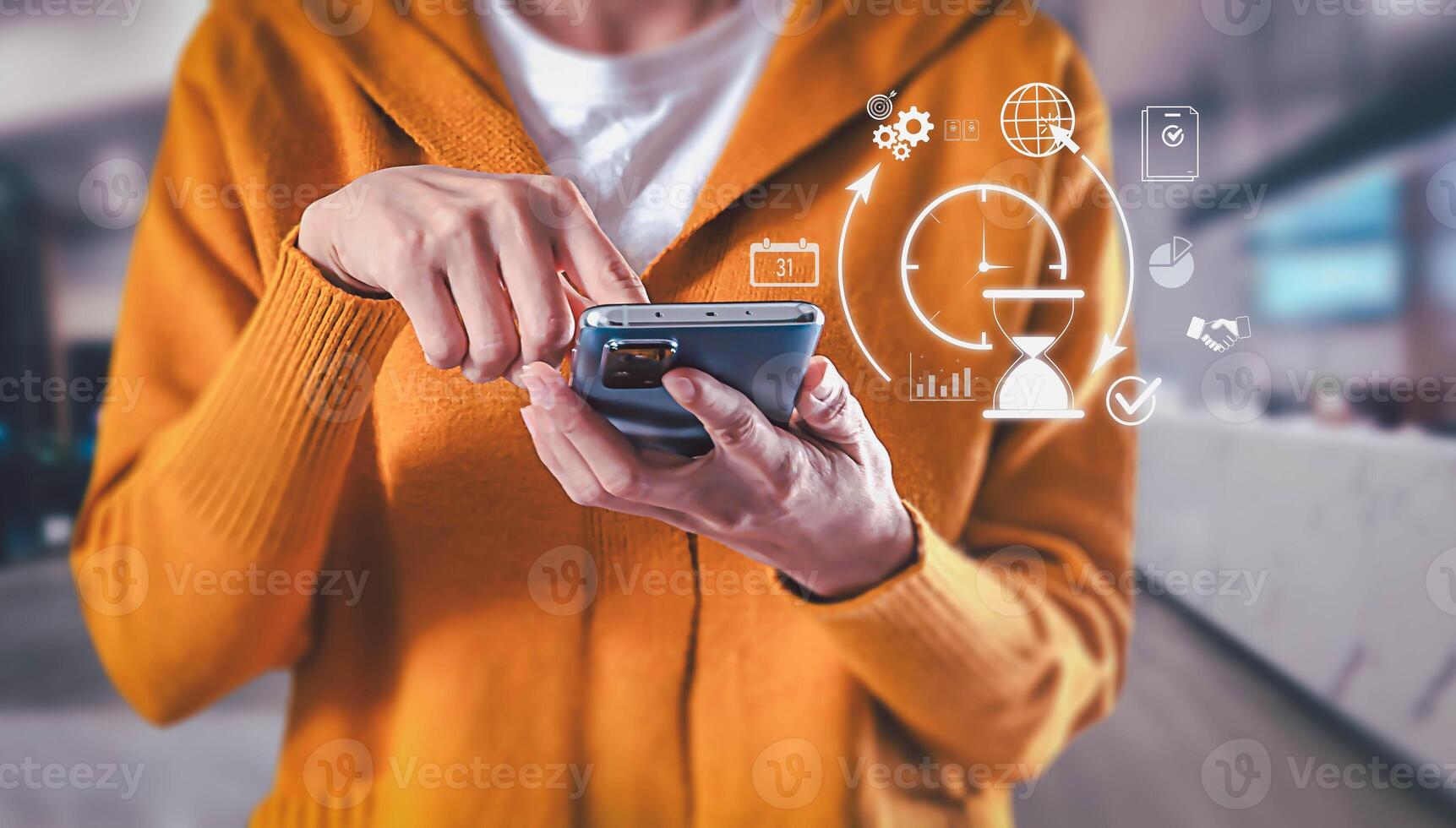 Woman in yellow sweater using smartphone with holographic display showing time management and productivity icons. Concept of business efficiency, task scheduling, and project organization. photo