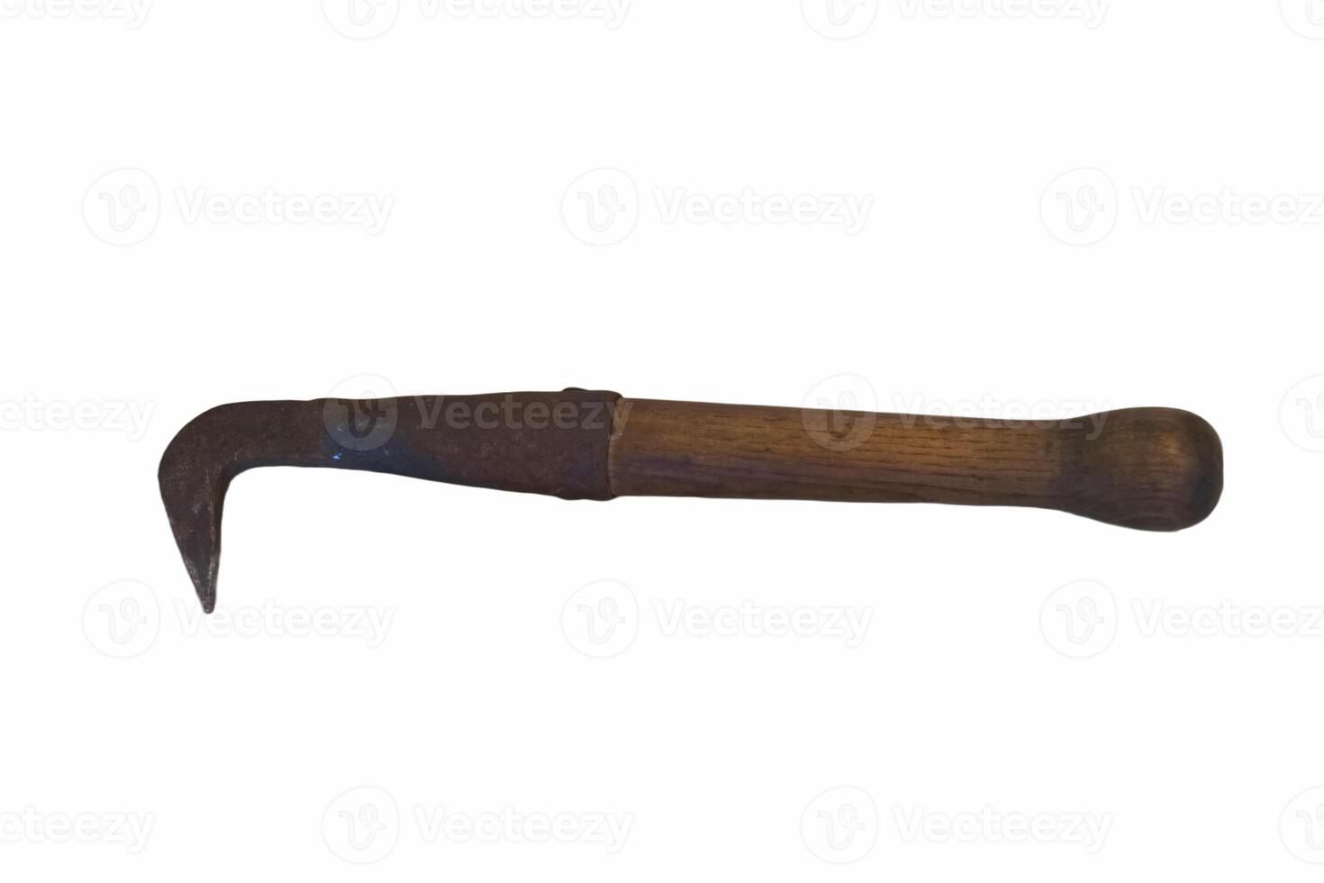 Craftsman tool with wooden handle used for carving and shaping materials in a workshop setting photo