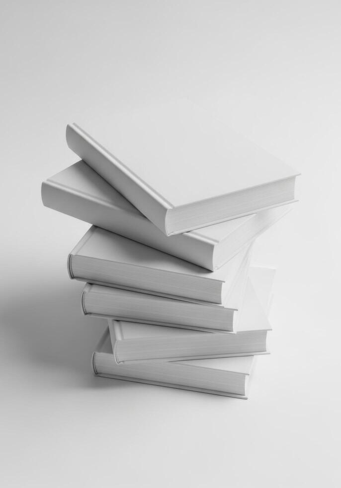 Minimalist stack of blank white hardcover books arranged in a tower, representing concepts of knowledge, education, and learning photo
