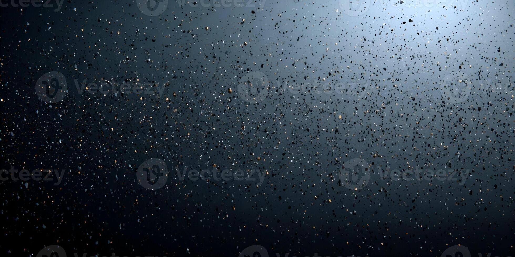 Dark blue gradient background with scattered gold black and white particles creating an abstract texture photo