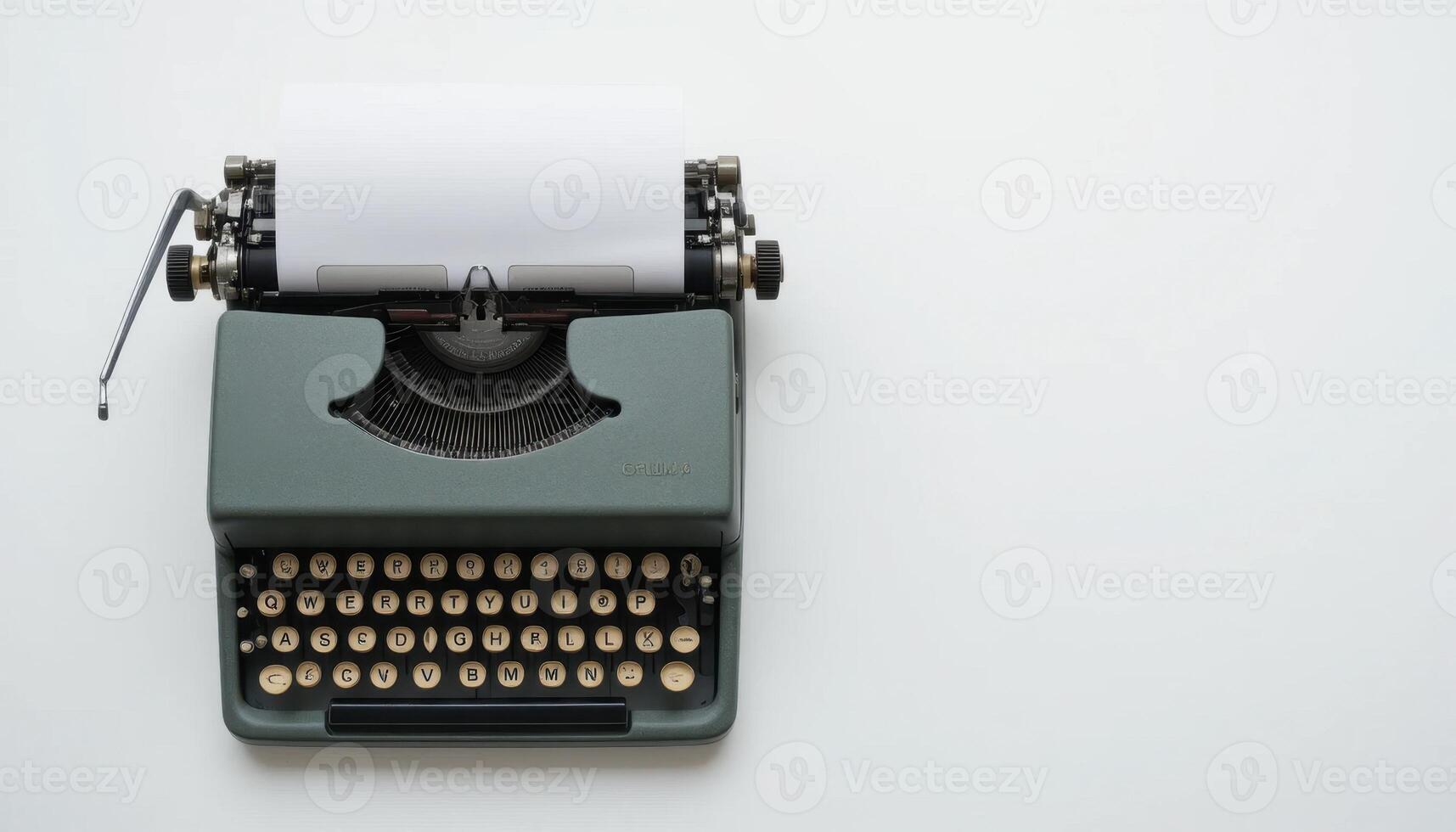 Classic Typewriter Displayed on a White Background With a Blank Sheet Ready for Writing photo