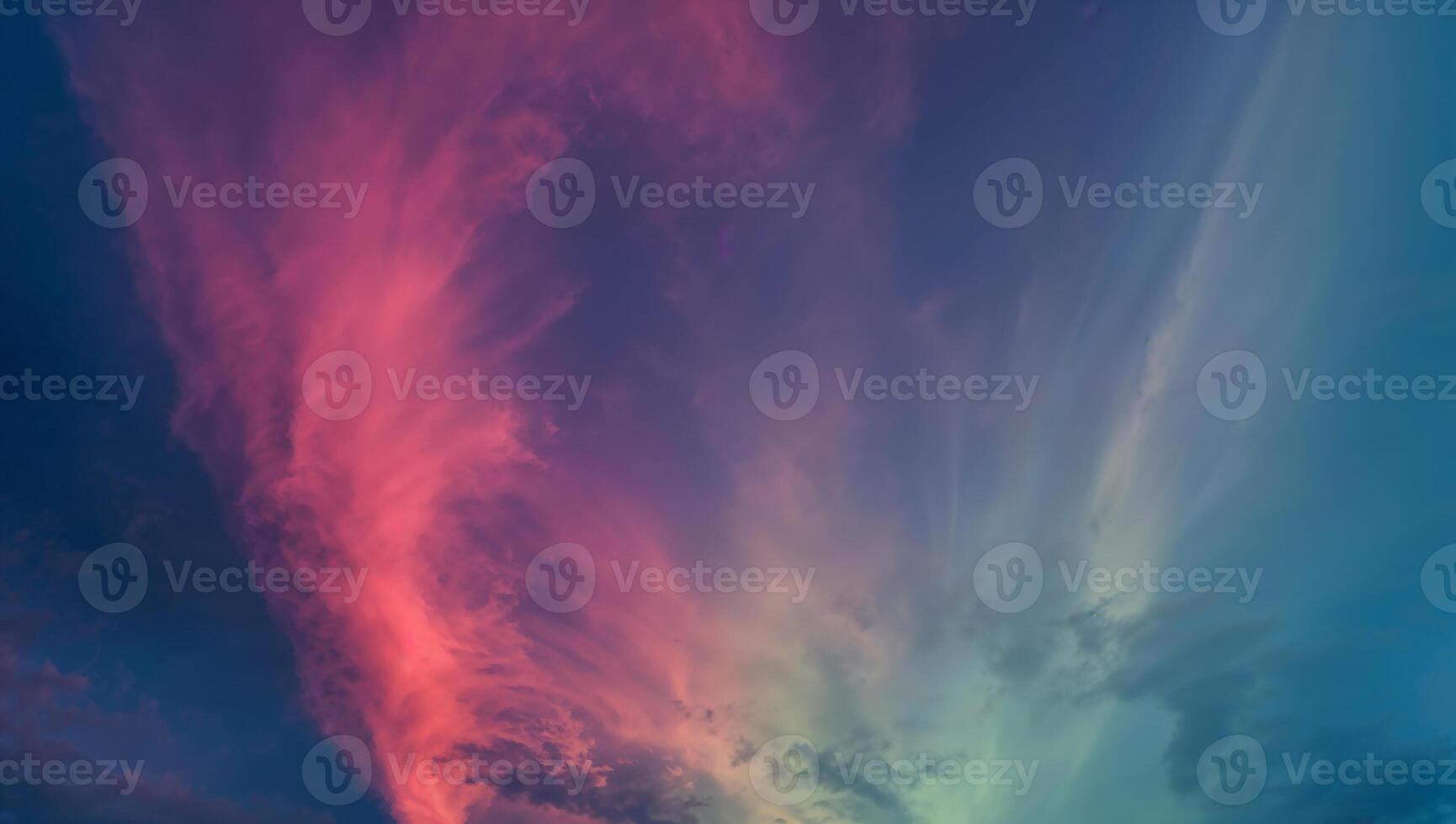 Vividly Colored Clouds at Dusk Creating Abstract Patterns photo