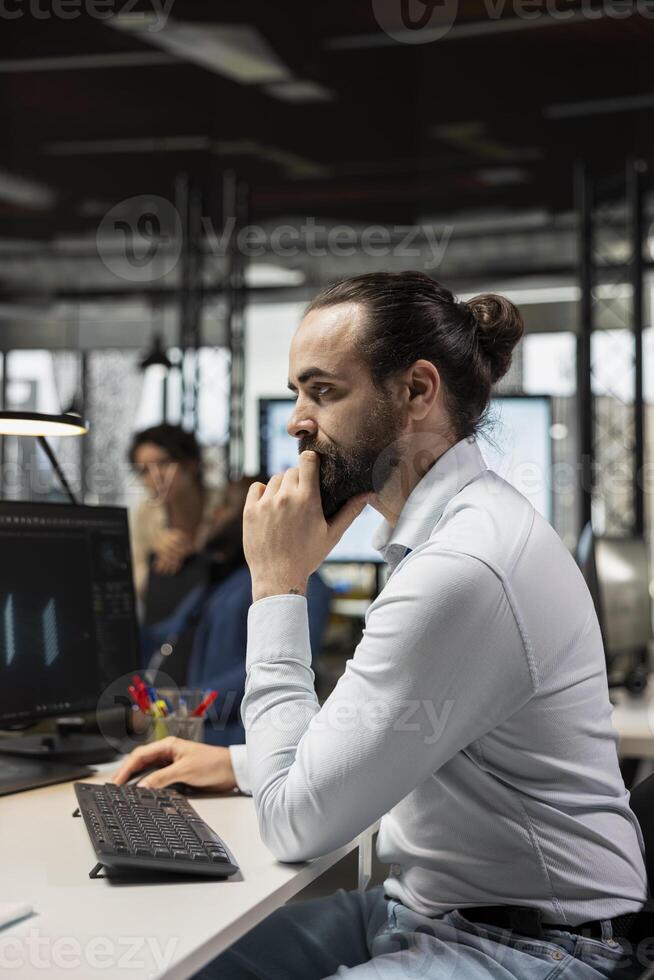 Data scientist utilizes neural networks and pattern recognition for a software to drive transformation and improve decision making, with big data deep learning systems for optimization. photo