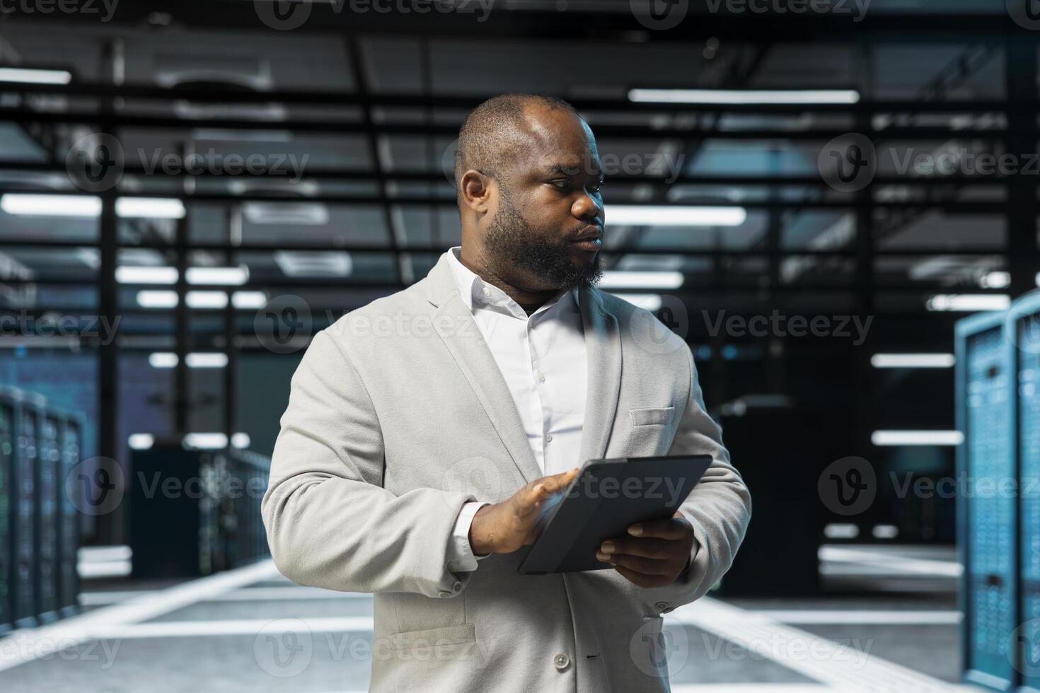 Close up of data center admin evaluating diagnostic reports on tablet, doing checkup to prolong hardware life span. Server hub employee monitoring infrastructure rigs, upgrading components photo