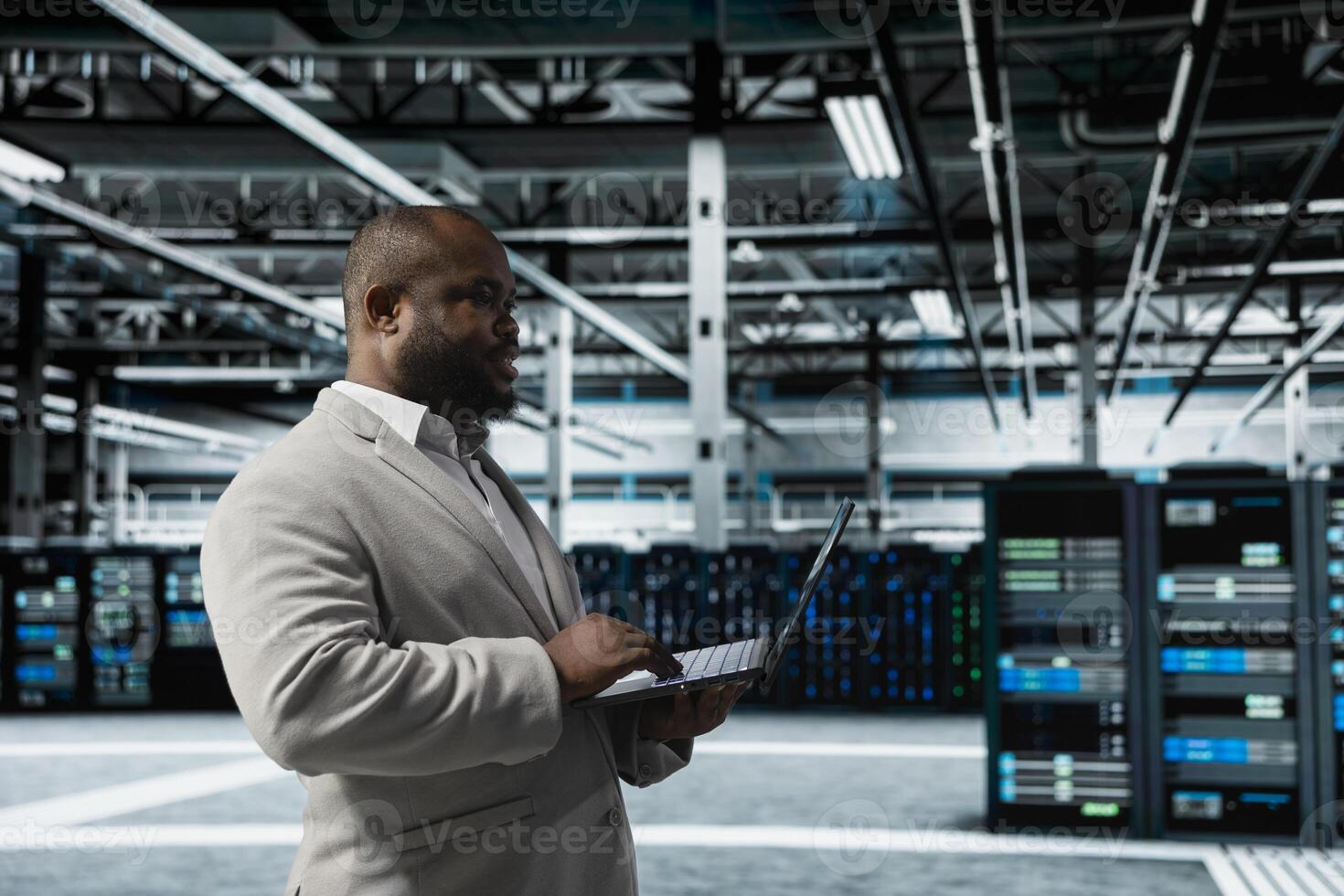 Data center engineer using laptop to automate errors detection, minimizing downtime. Server hub IT expert monitoring components for potential failures, looking for network issues affecting rigs photo