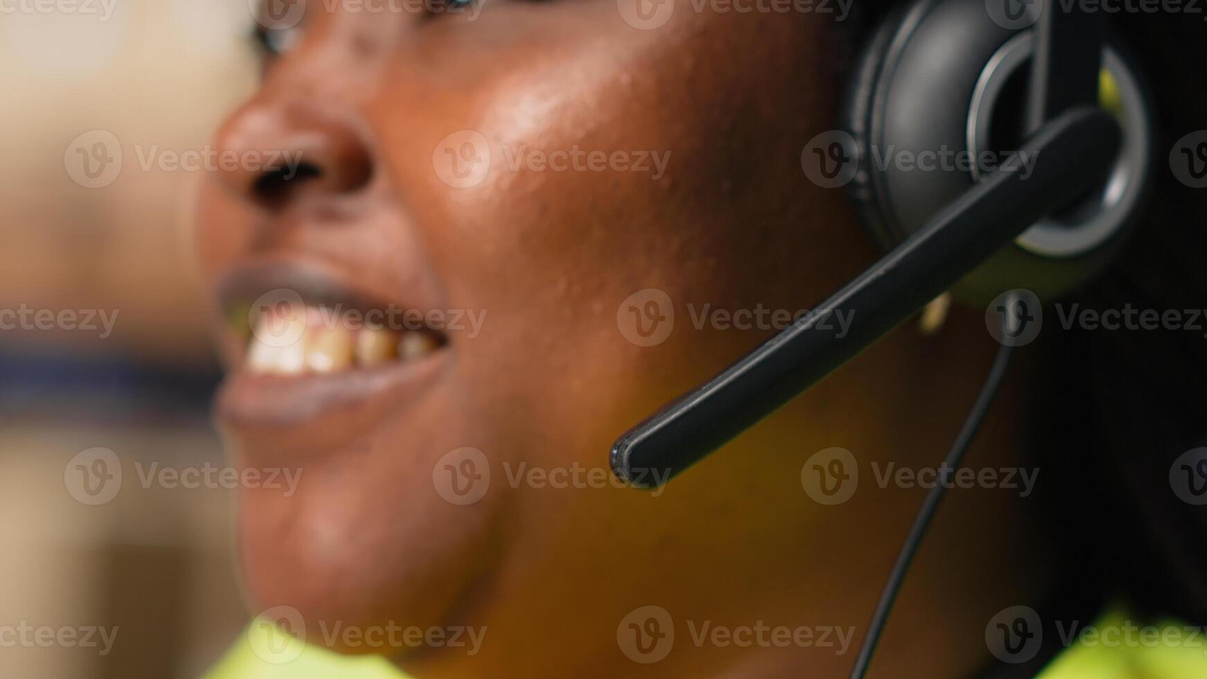 Call center clerk parcel tracking and order dispatch on help line, working in an online shopping logistics center. Worker resolving cargo issues and packages lost in distribution process. Camera B. photo