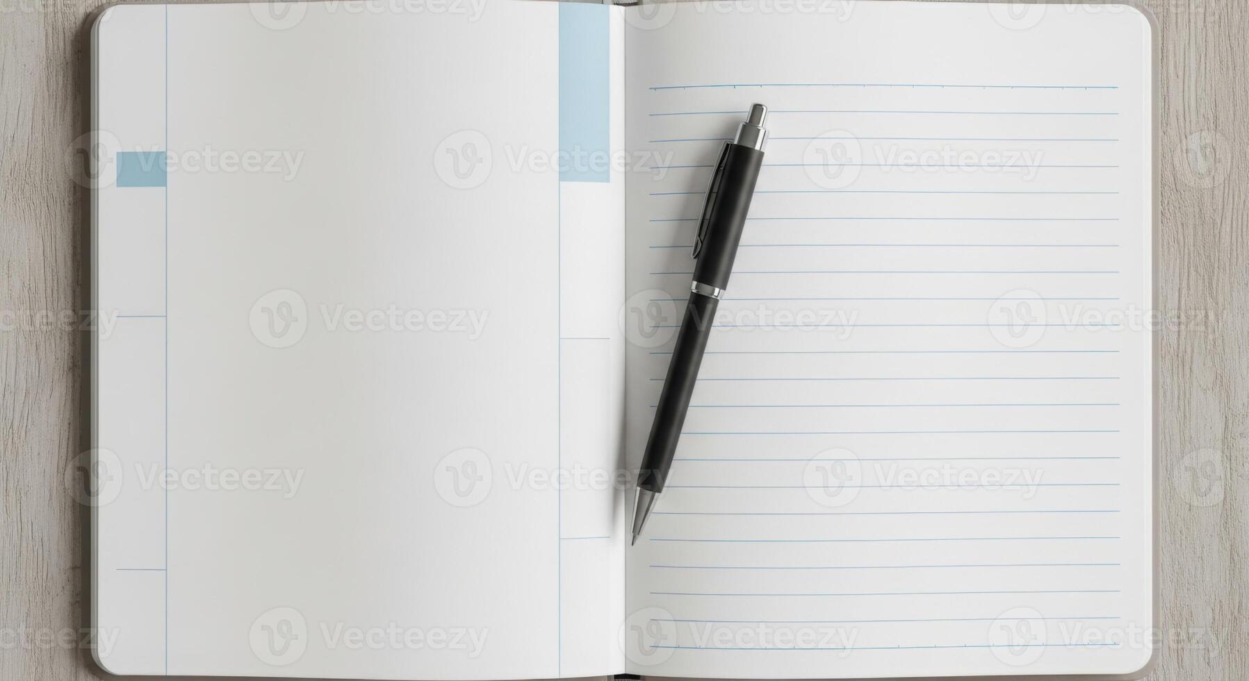 Open notebook with lined pages and black pen showcasing a clean workspace perfect for education and business projects photo