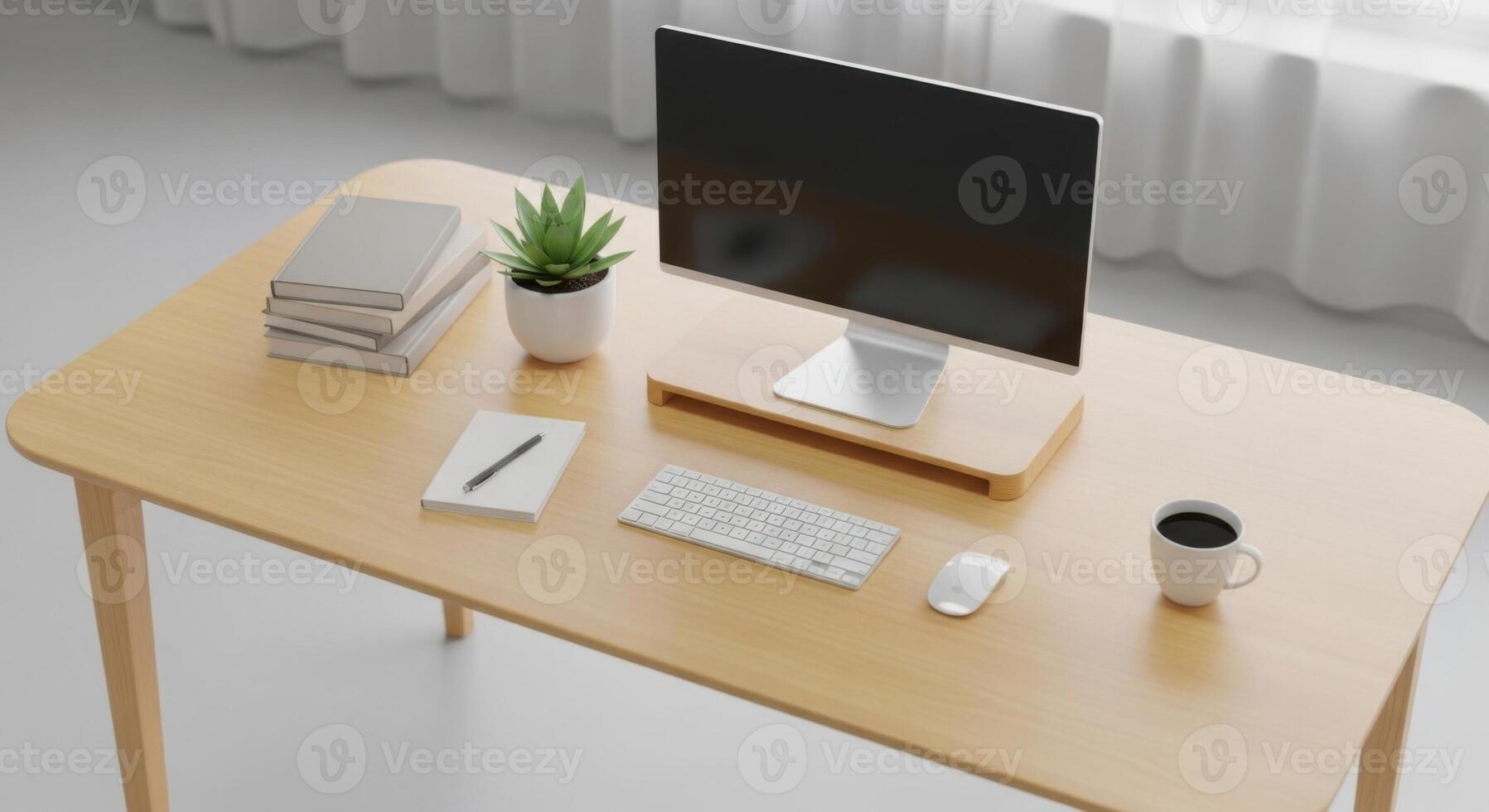 A desk with a computer, keyboard, mouse and coffee cup photo