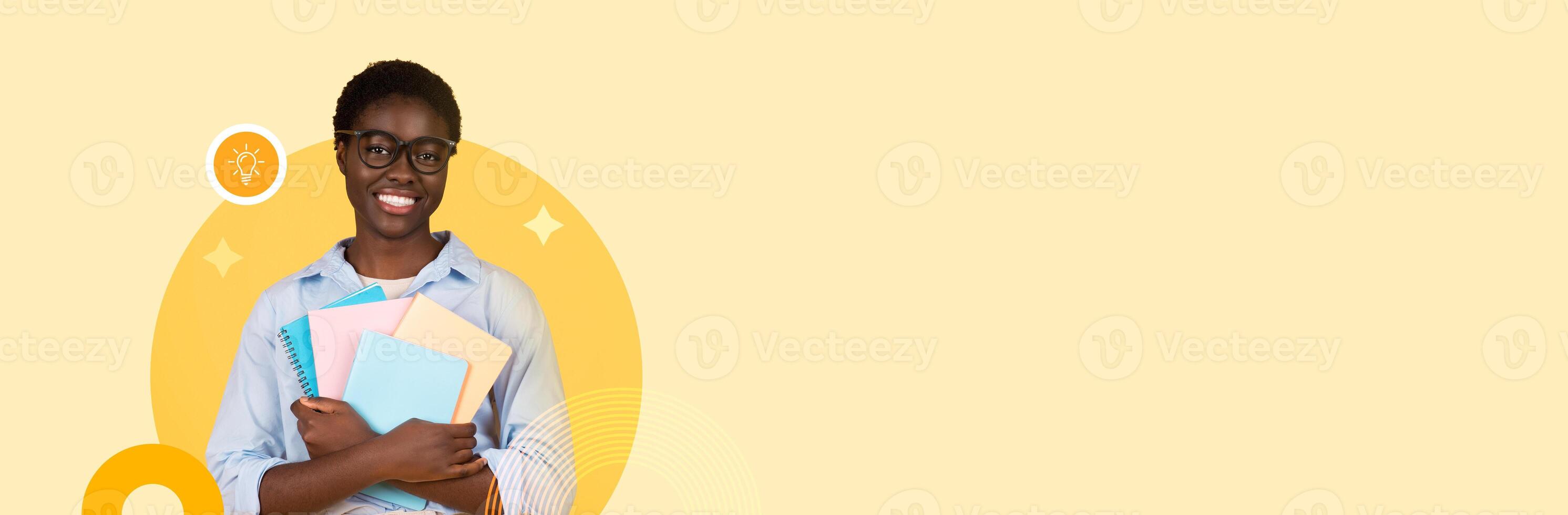 A confident student stands in a bright and modern educational environment, holding colorful notebooks and smiling. The background is soft and inviting, creating a positive atmosphere for learning. photo