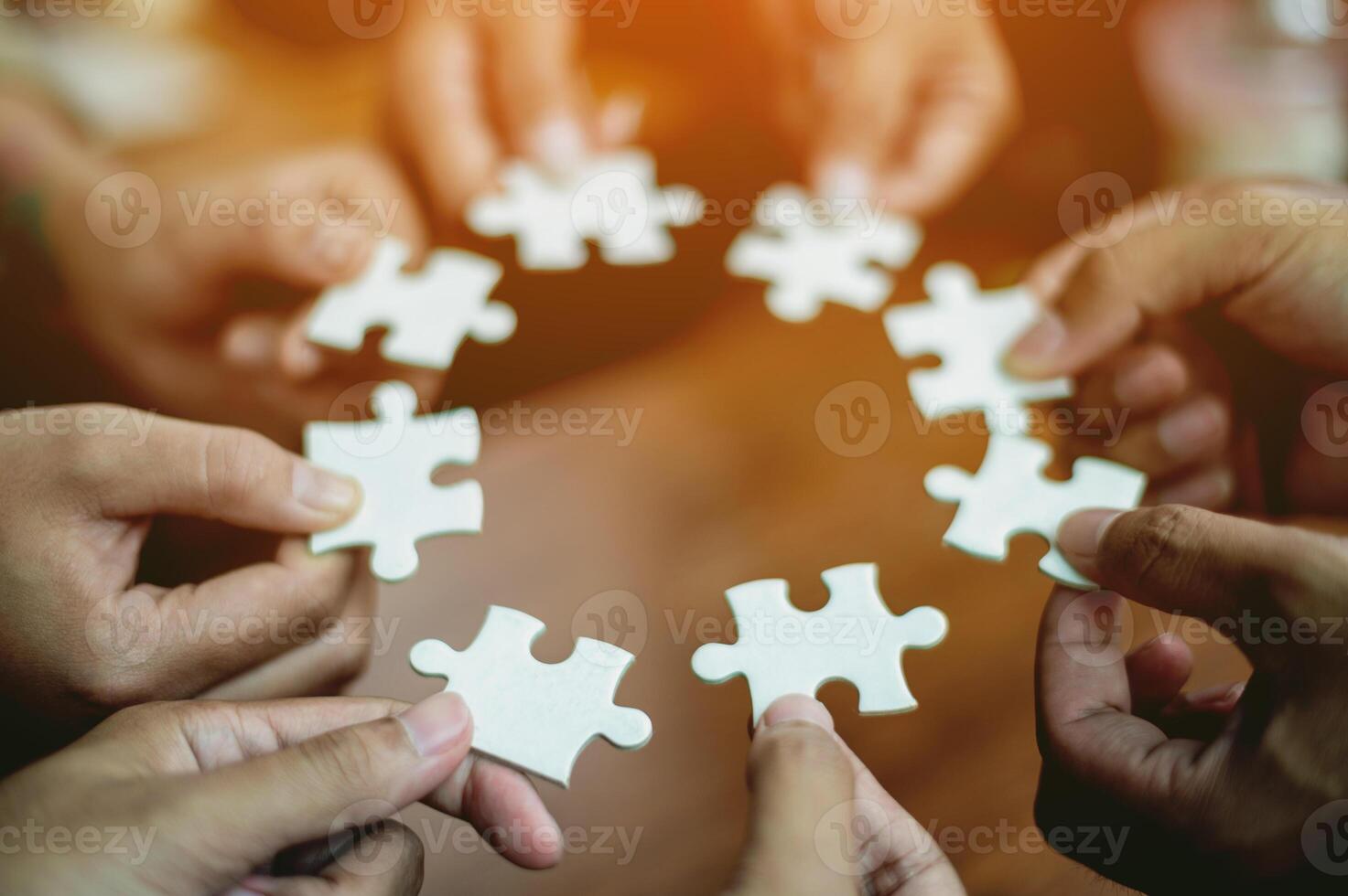 Jigsaw puzzles combine teamwork, unity and teamwork, achieving success in work. photo