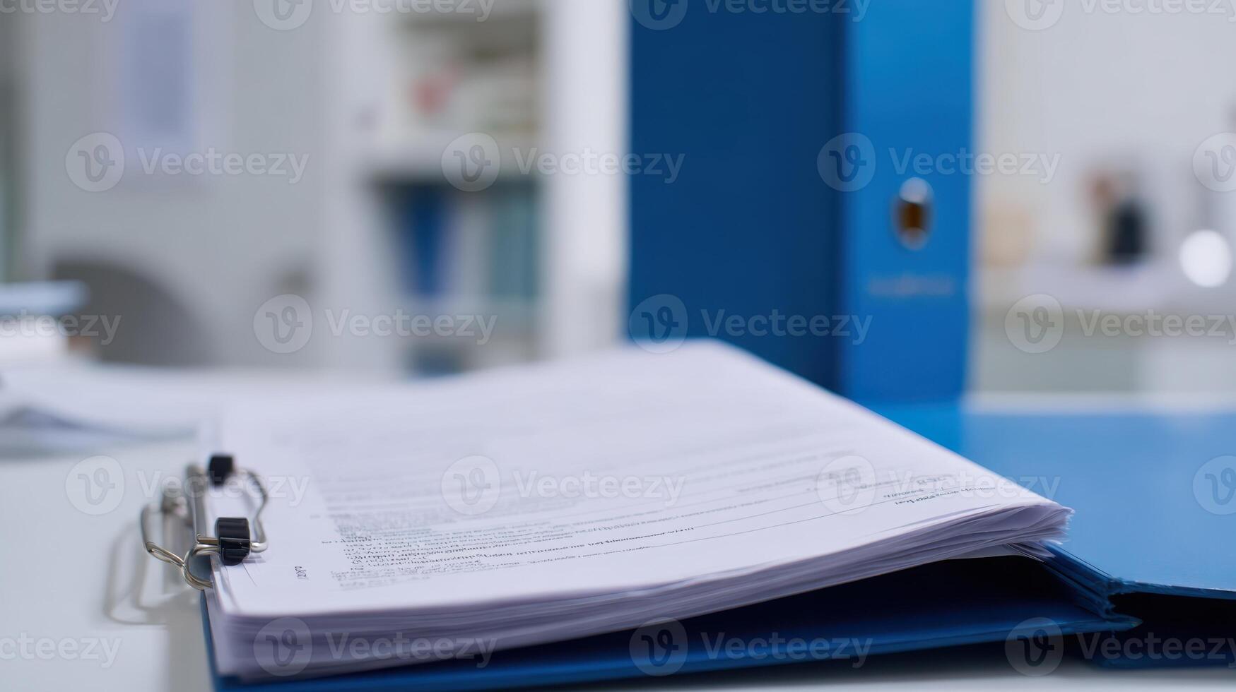Open Binder With Documents On Office Desk. Organized Paperwork For Efficient Office Management photo