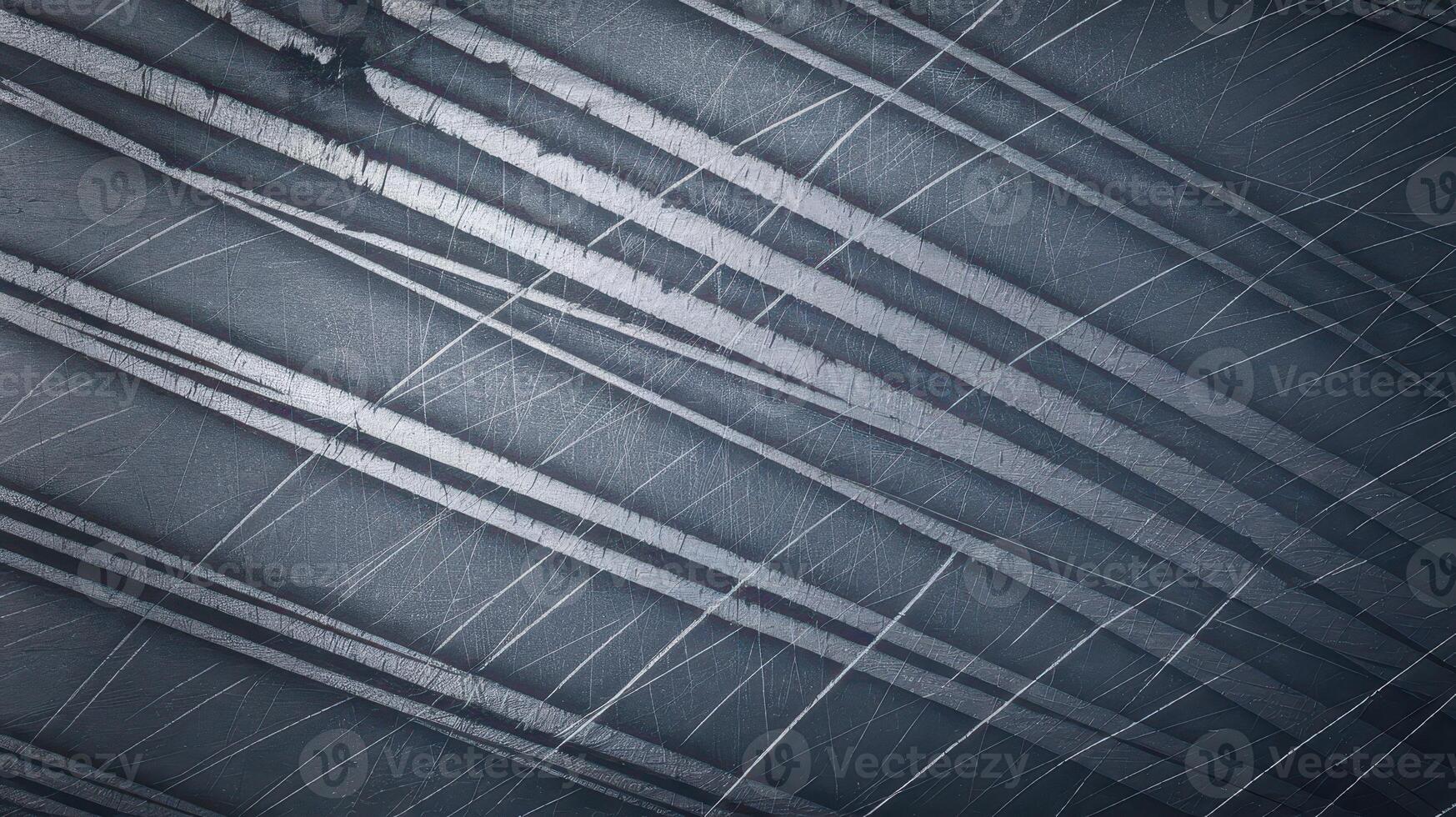 Scratched Metal Surface Showing a Diagonal Pattern of Deep and Faint Lines photo