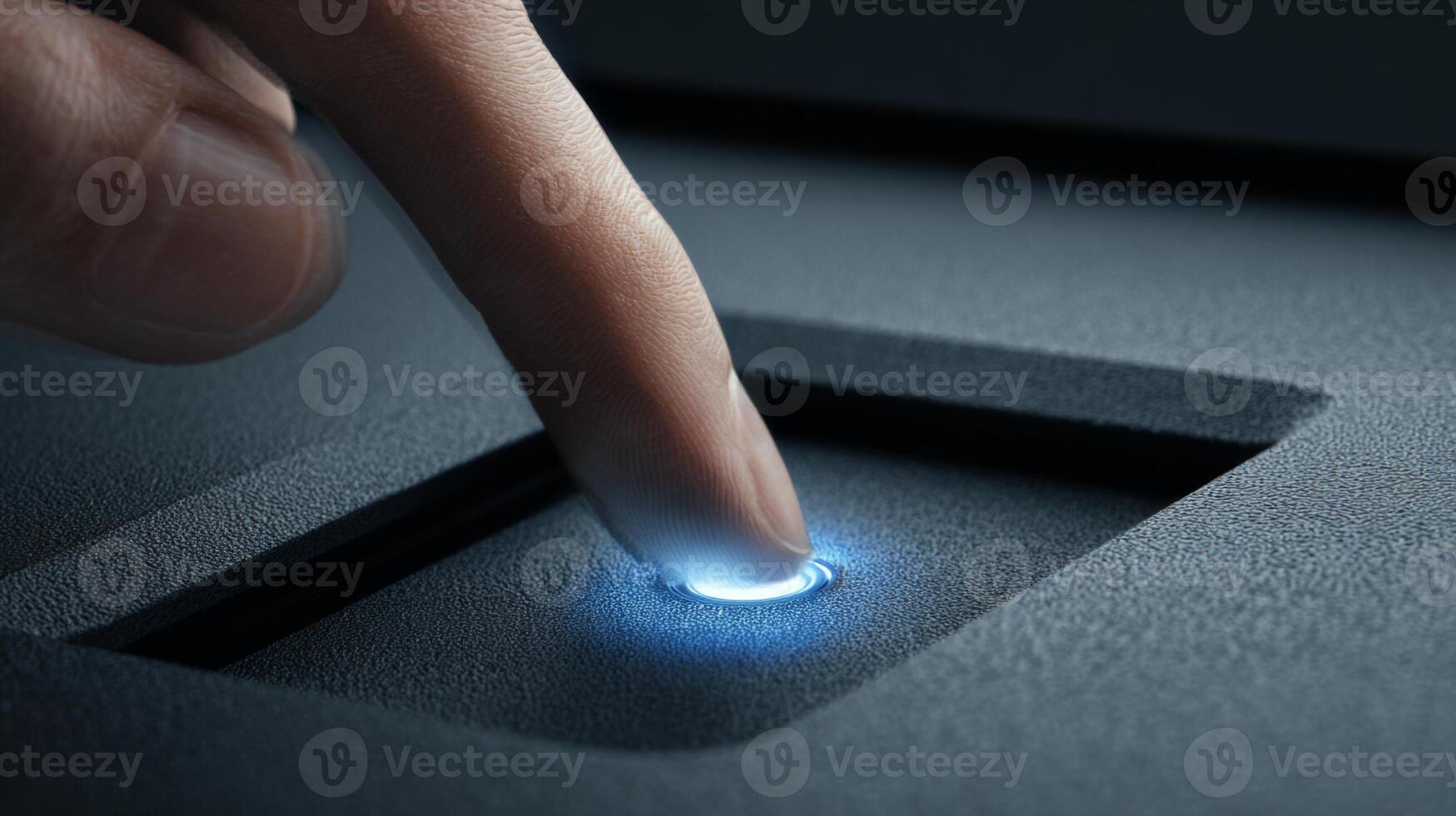 Close-up of a hand, placing a finger on a biometric fingerprint scanner, showcasing advanced technology and security features. photo