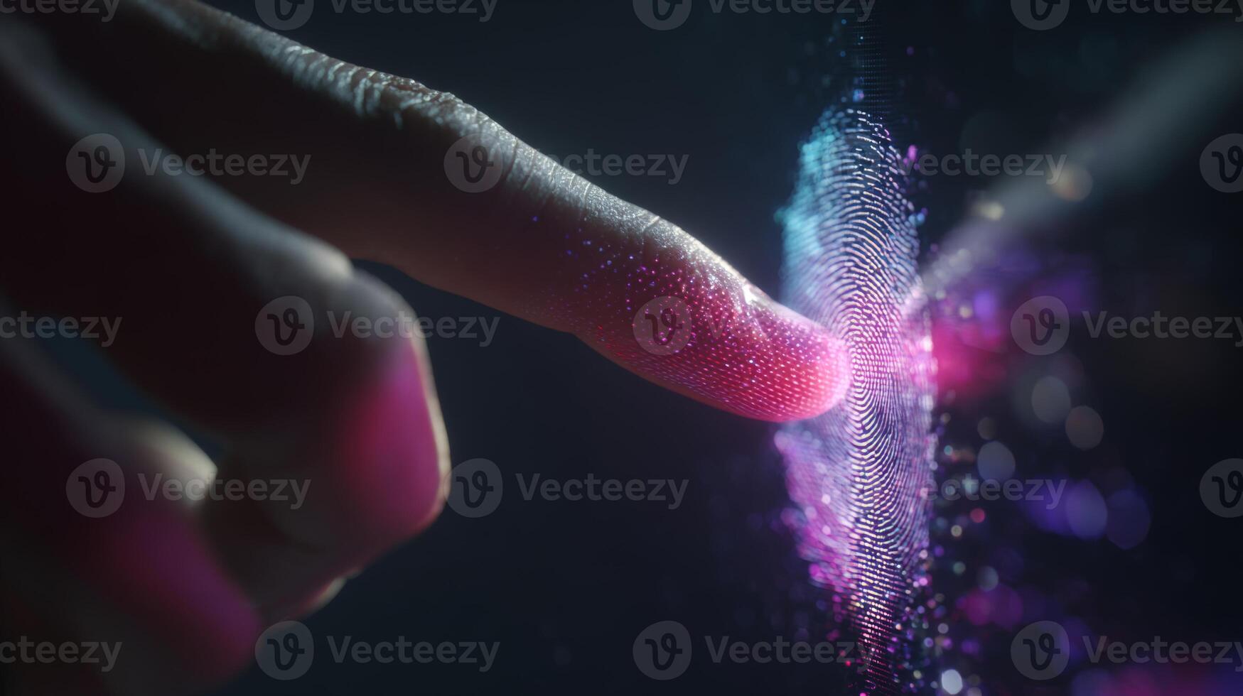 A close-up of a human finger touching a shimmering, digital interface, creating a vibrant display of light and color. photo
