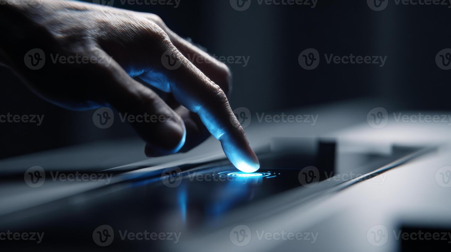 A close-up of a hand interacting with a futuristic touchscreen interface, featuring a glowing blue activation button. photo