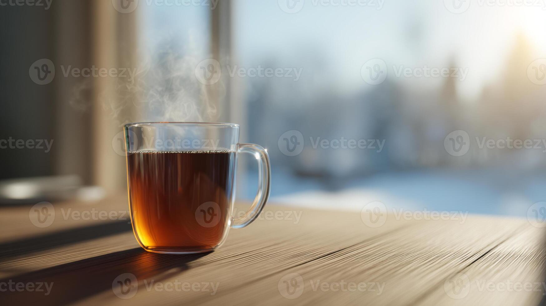 A steaming cup of tea sits on a wooden table with a cozy winter backdrop, creating a warm and inviting atmosphere. photo