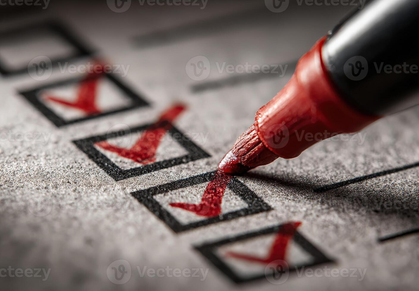 Close-up of red marker highlighting checked boxes on a checklist, emphasizing organization and task completion in a professional setting with textured paper background photo