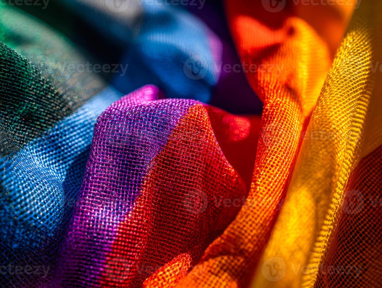 Vibrant multicolored fabric with shimmering texture and intricate weave pattern photo