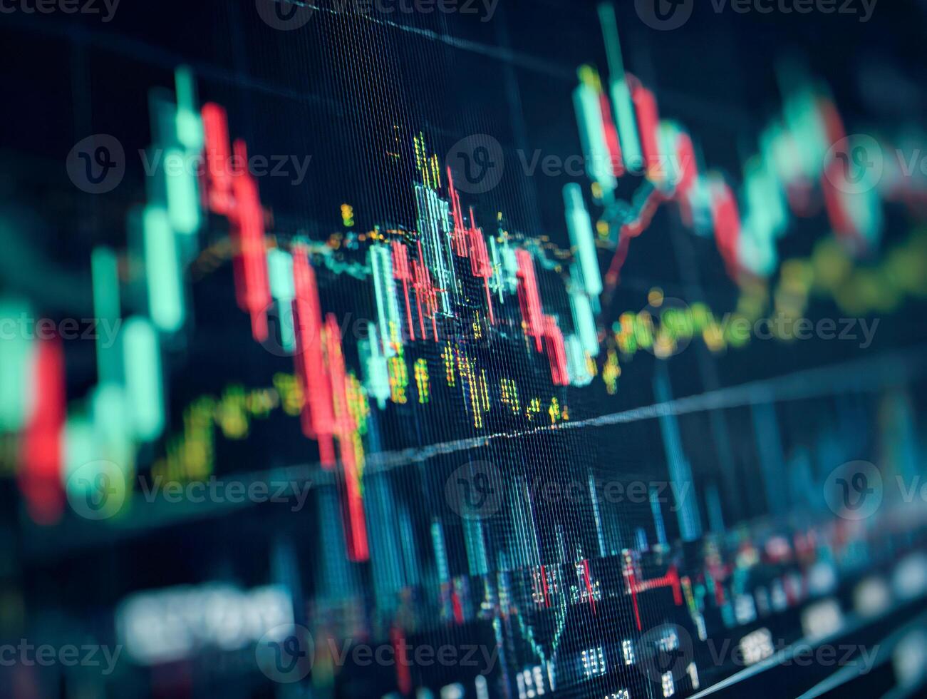 Detailed view of digital financial market charts with fluctuating candlestick patterns and trading volume indicators on a computer screen in low light setting photo