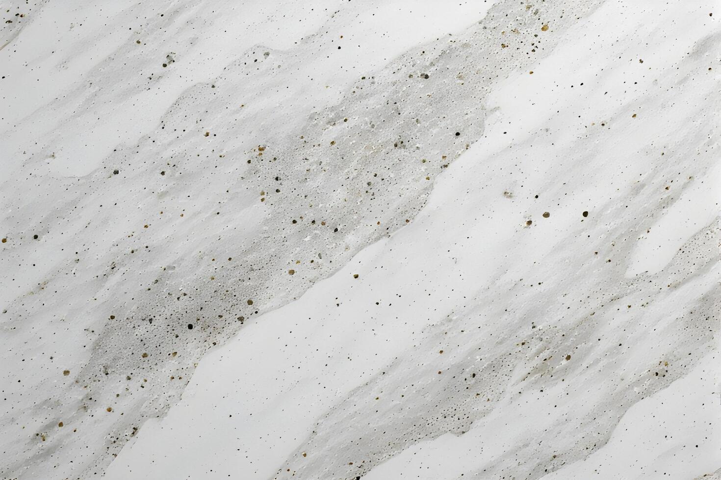Dynamic white marble with flowing diagonal patterns of light grey and abundant fine dark speckles, creating a unique abstract texture photo