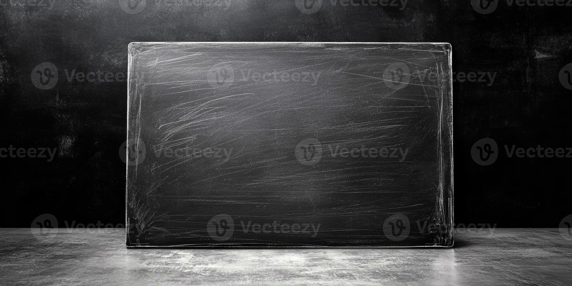 A smooth, blank blackboard with a clean surface ideal for notes, drawings, or educational activities in classrooms or creative spaces photo