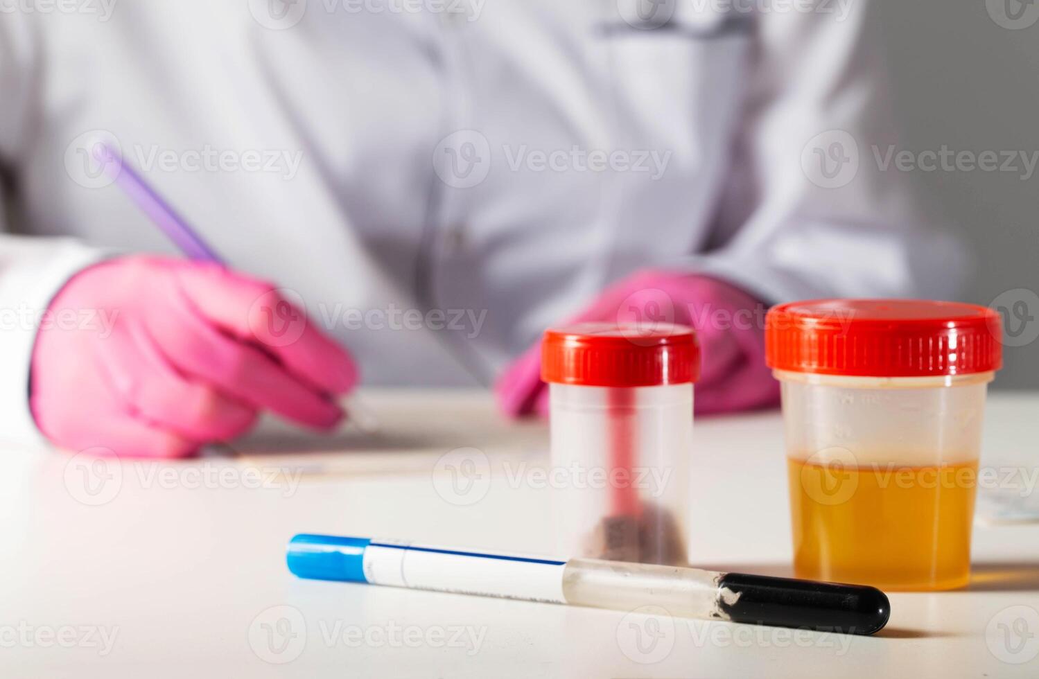 Analyzes of ejaculate, urine and feces on the table against the background of a doctor laboratory assistant. Concept for identifying infections in bacterial culture tests, copy space for text photo