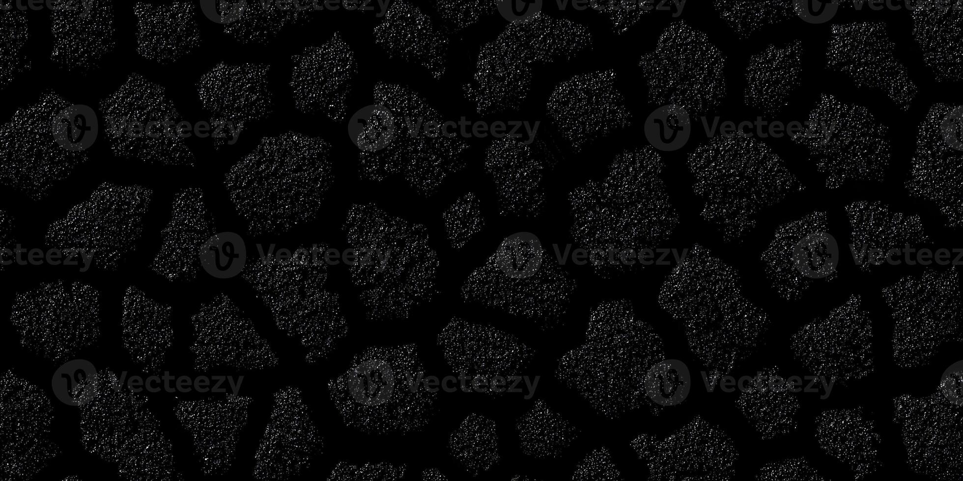 This dark abstract background features an irregular pattern of sparkling granular shapes providing a textured surface photo