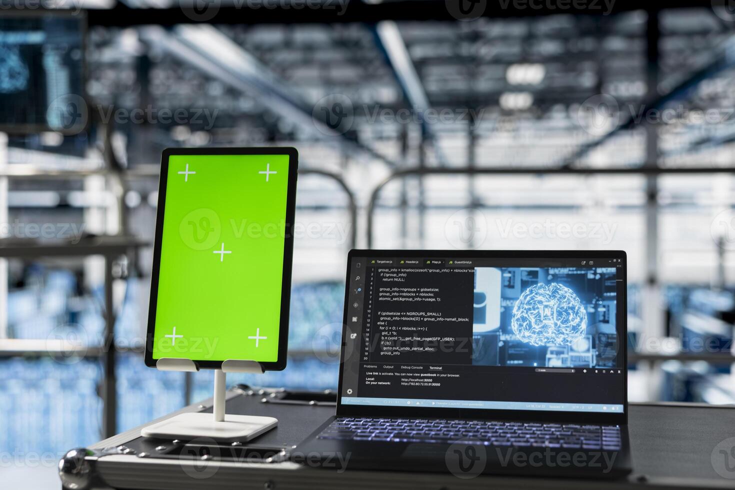 Close up of mockup tablet next to laptop in server room enabling AI training and inference Green screen device next to notebook in data center training infrastructure for AI workloads photo