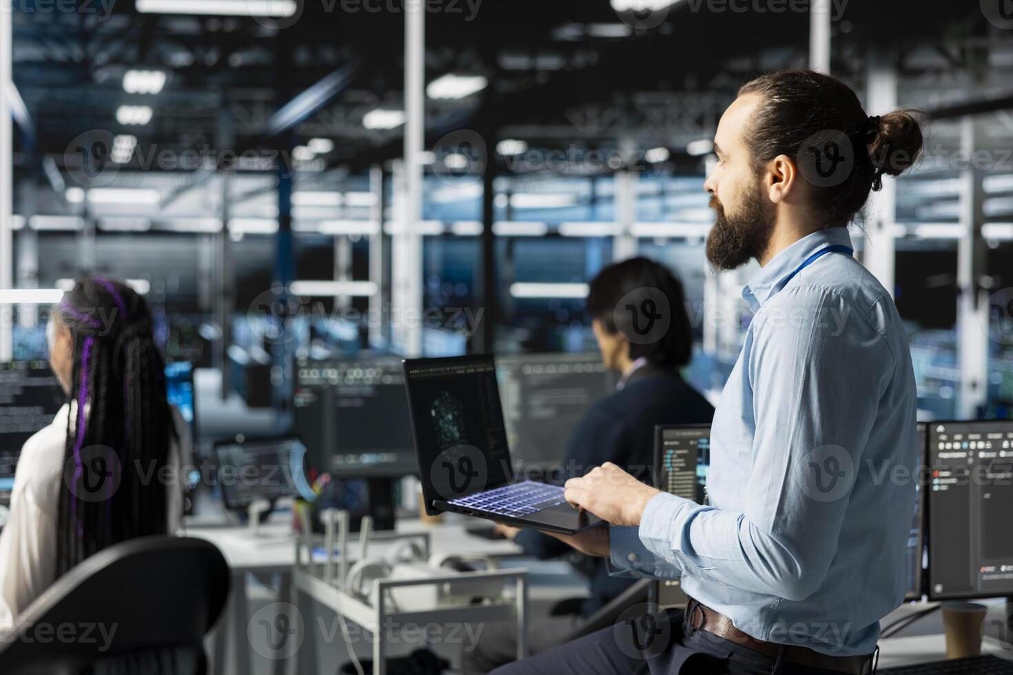 Teamworking engineers in data center installing upgraded server racks systems helped by AI technology. Server room colleagues upgrading enterprise networks equipment using artificial intelligence photo