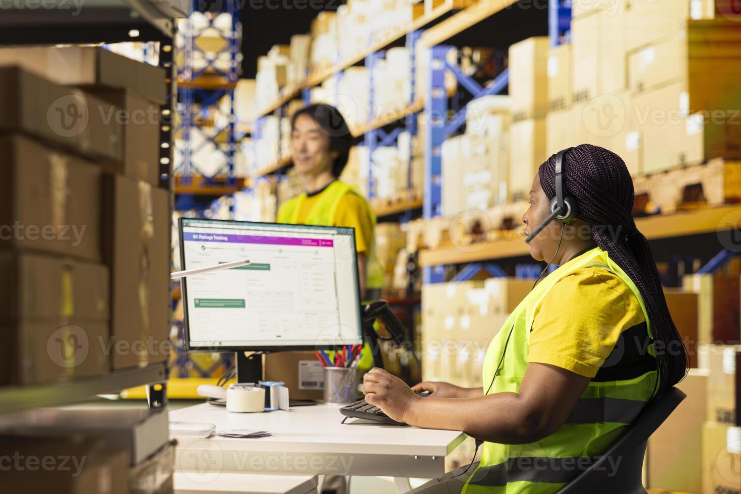 Call center clerk parcel tracking and order dispatch on help line, working in an online shopping logistics center. Worker resolving cargo issues and locating packages lost in distribution process. photo