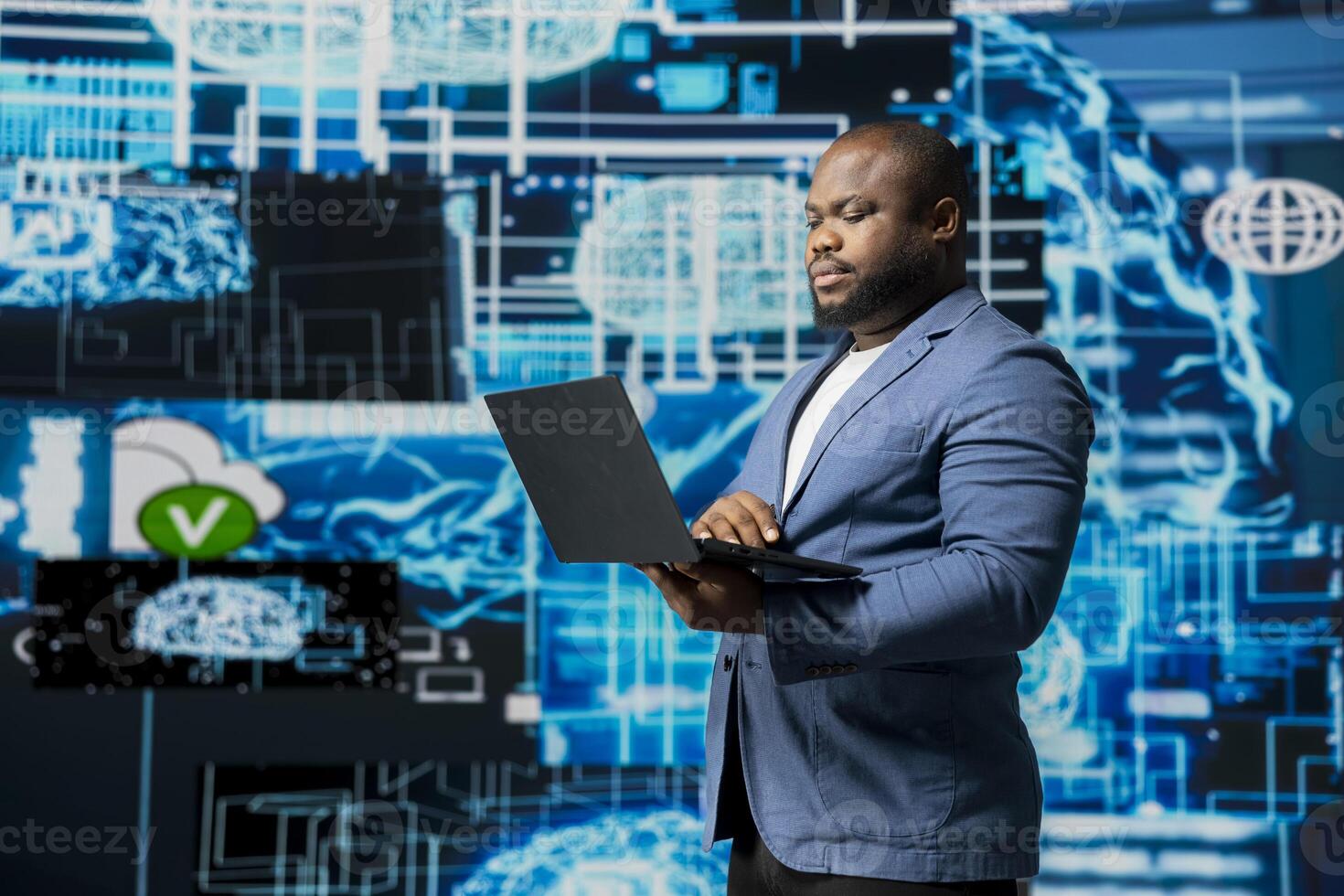 Modern african american businessman working in AI data visualization environment, illustrating computer science, and automation tools for machine learning, neural networks systems. photo